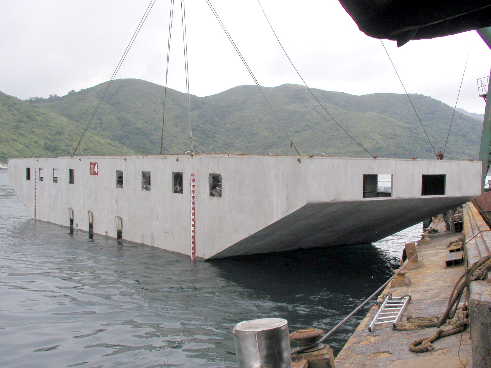 Photo of deployment of steel vessel artificial reef at Long Harbour