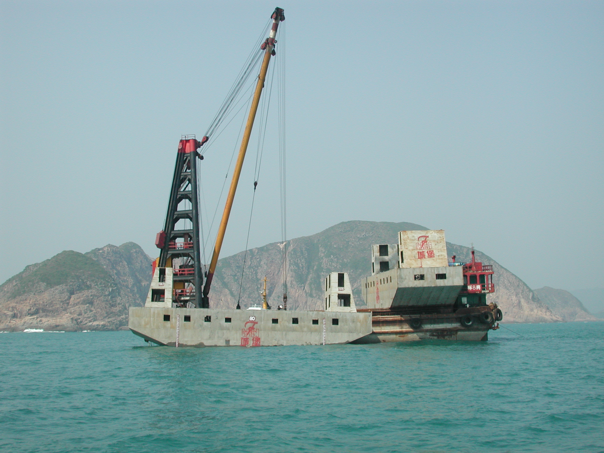 Photo of deployment of steel vessel artificial reef with used tyres