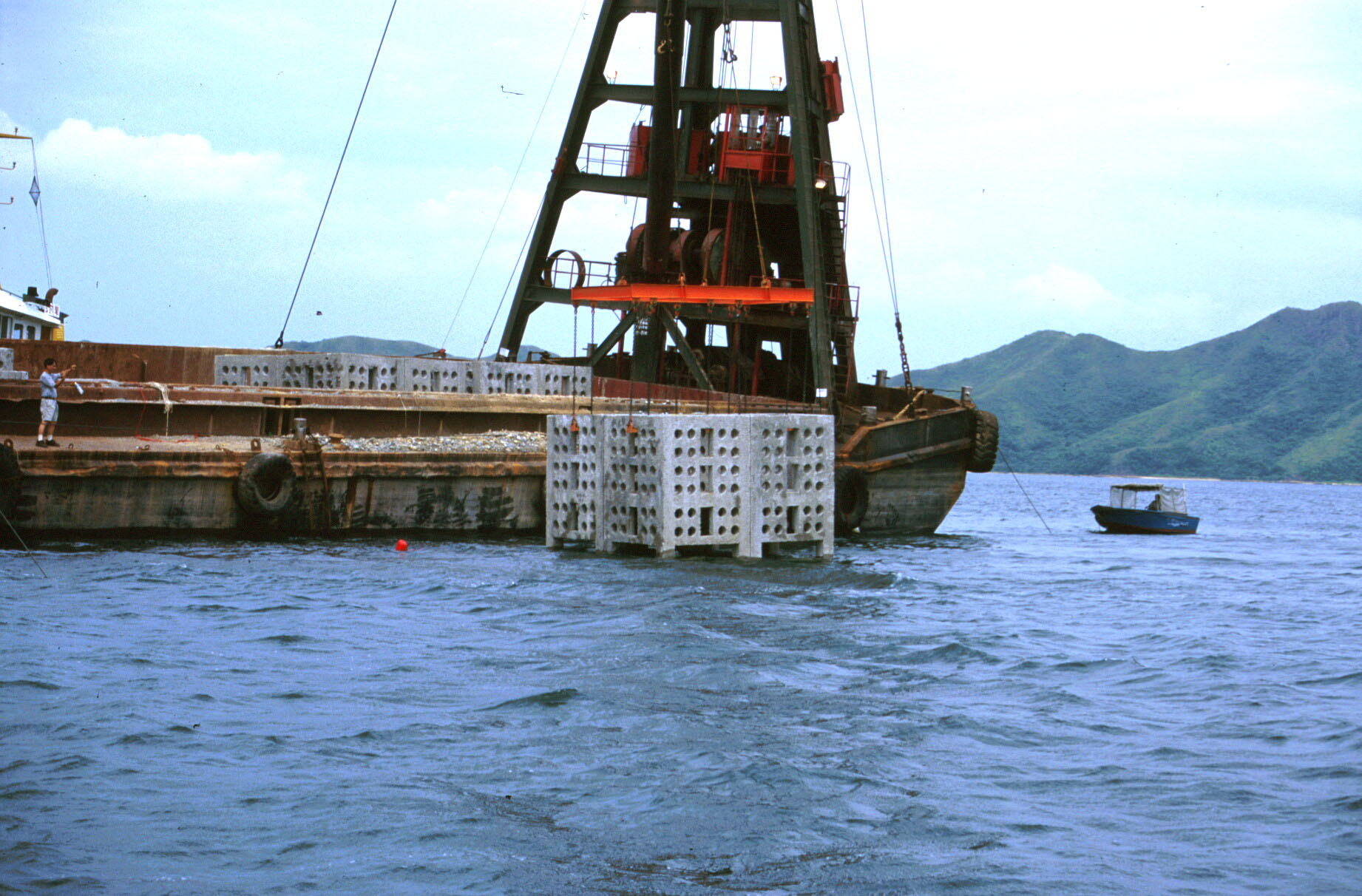 Photo of deployment of concrete box artificial reef