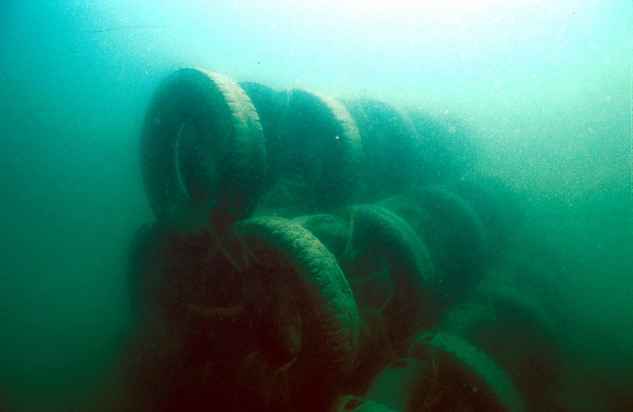 Underwater photo of used tyre artificial reef 