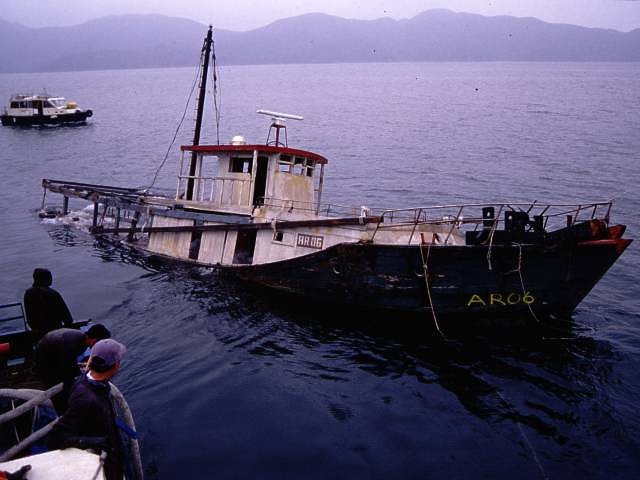 Photo of deployment of wooden vessel artificial reef