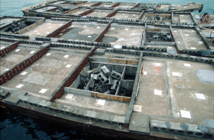 Photo of river barge artificial reef with container
